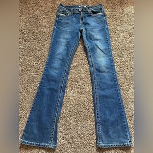 Charme bootcut jeans with white stitching. Size 27.